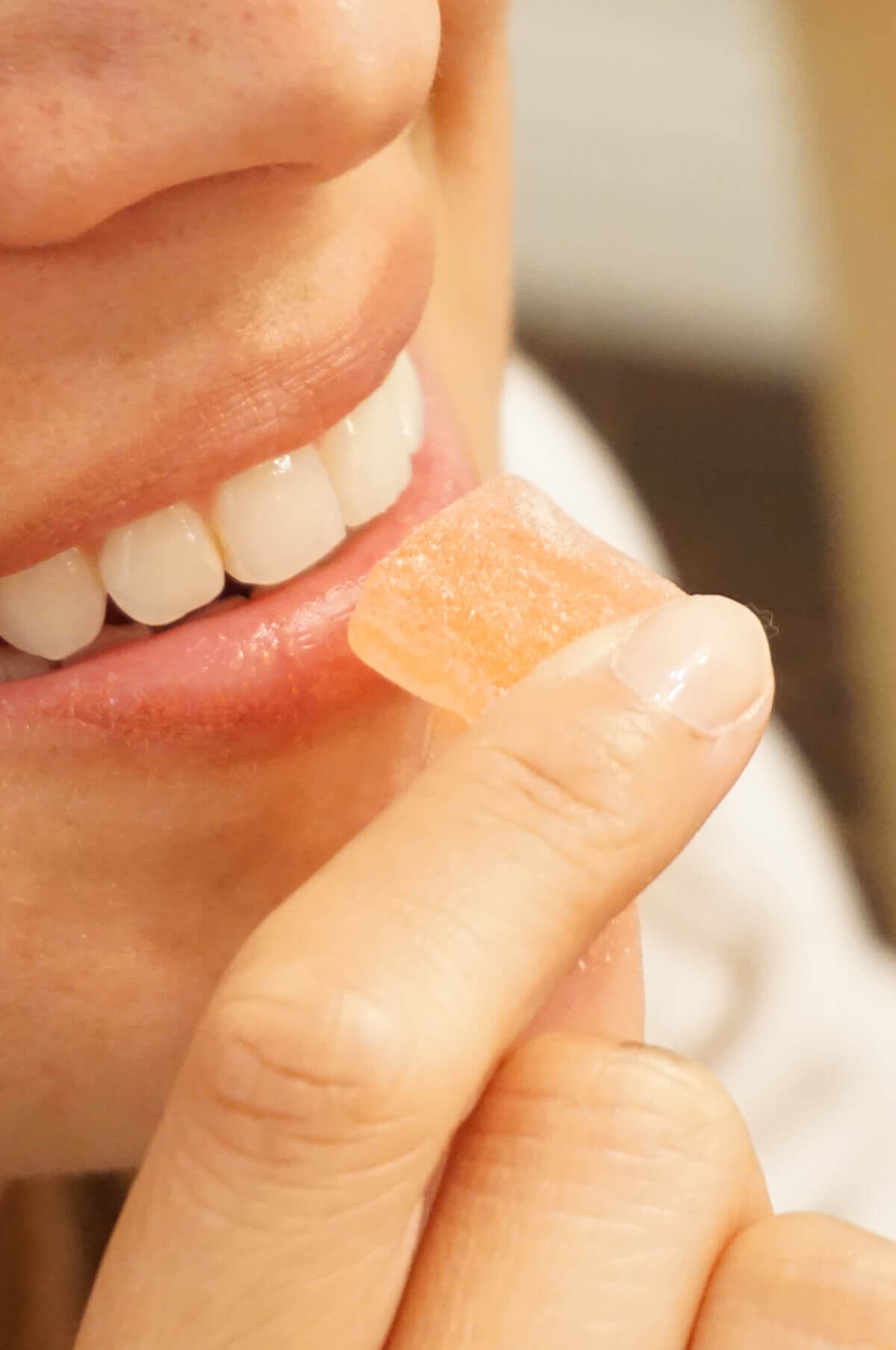 Woman eating Gummy